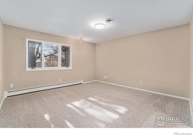 carpeted empty room featuring a baseboard radiator, visible vents, and baseboards