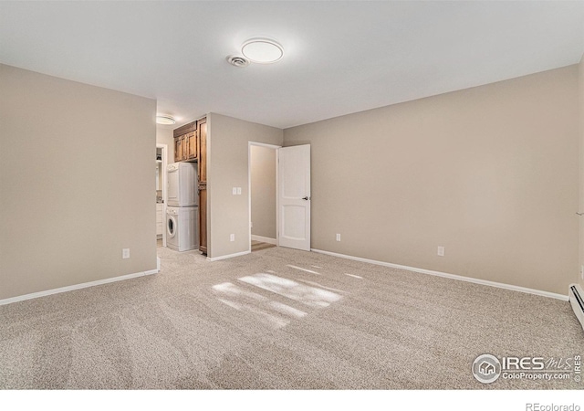 unfurnished bedroom with light carpet and baseboards