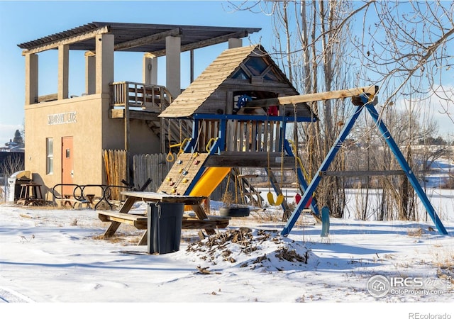 snow covered playground with playground community