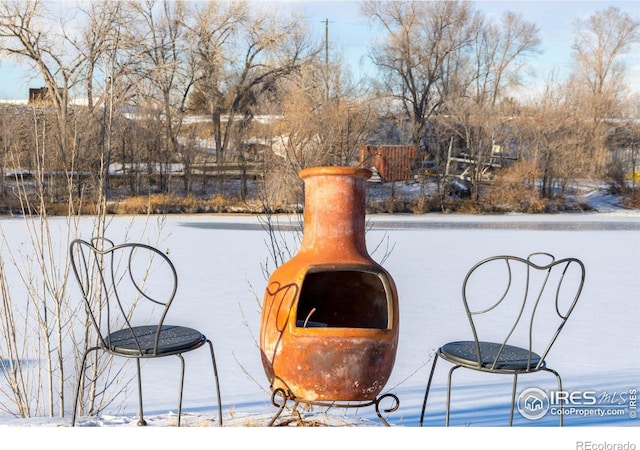 exterior details featuring a wood stove