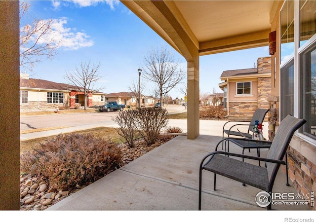 view of patio / terrace with a residential view