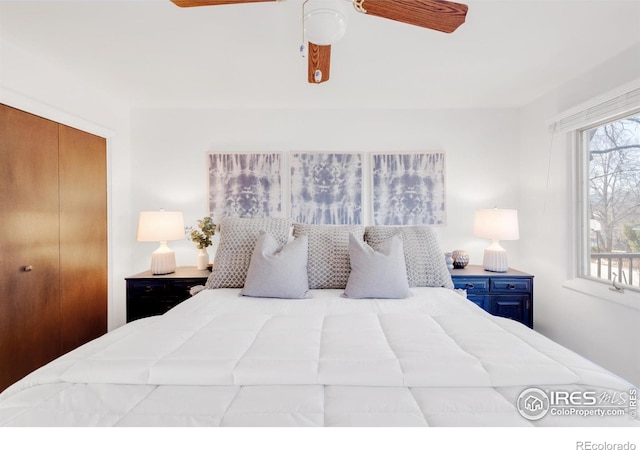 bedroom featuring a ceiling fan and a closet