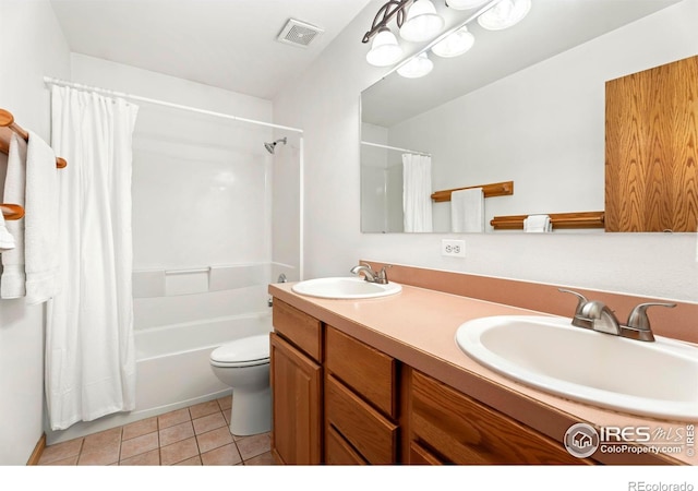 full bath with tile patterned flooring, visible vents, a sink, and toilet