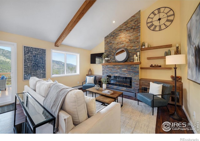 living area featuring wood finished floors, baseboard heating, a fireplace, high vaulted ceiling, and beam ceiling