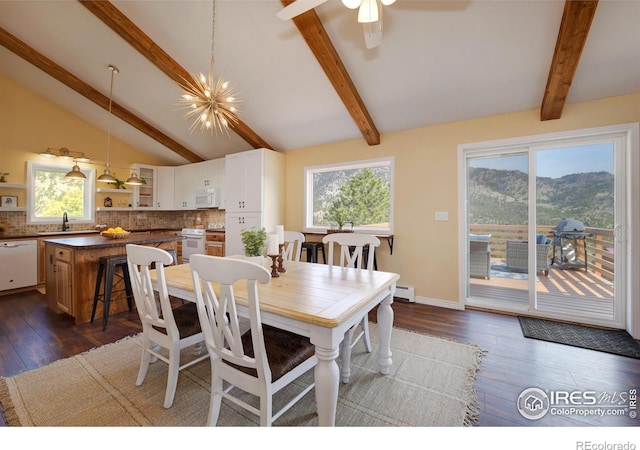 dining area featuring vaulted ceiling with beams, dark wood finished floors, and a wealth of natural light