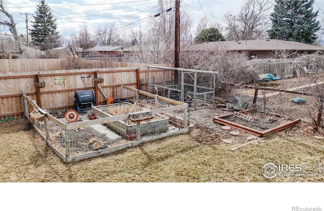 view of yard featuring a garden and fence