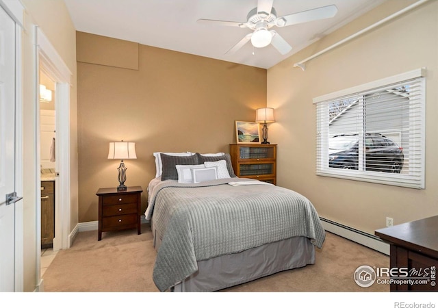 bedroom with light carpet, ceiling fan, a baseboard heating unit, and baseboards