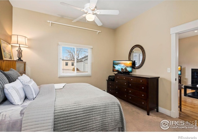 bedroom featuring carpet flooring, ceiling fan, and baseboards