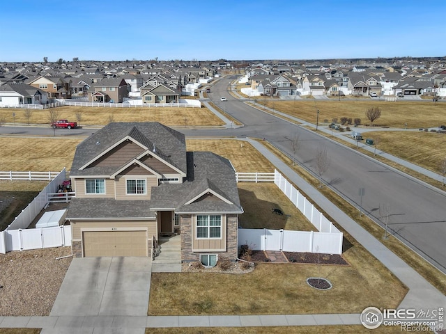 drone / aerial view with a residential view