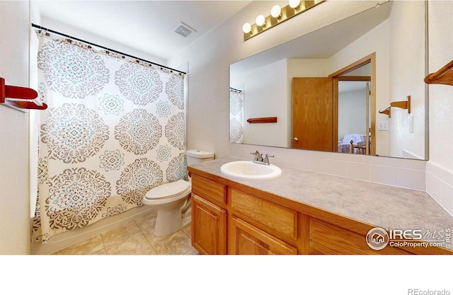 full bath featuring visible vents, a shower with shower curtain, toilet, tile patterned floors, and vanity