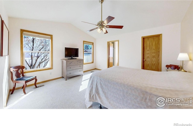 bedroom featuring lofted ceiling, ceiling fan, baseboards, and carpet flooring