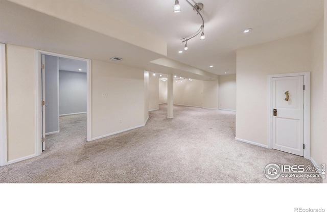 interior space featuring carpet, visible vents, baseboards, and recessed lighting