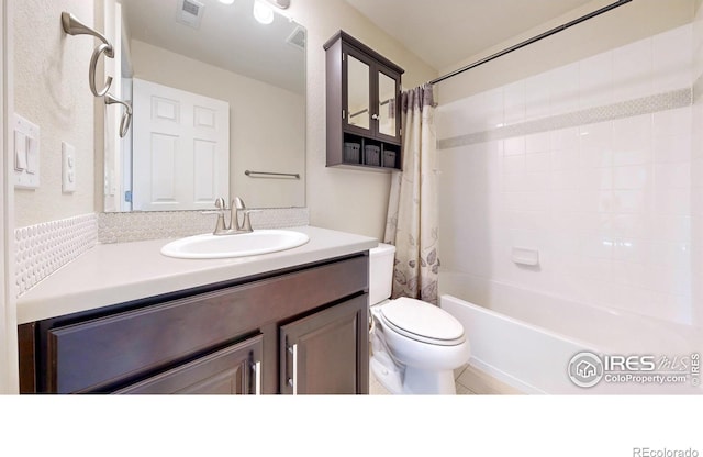 full bathroom featuring toilet, shower / tub combo, vanity, and visible vents