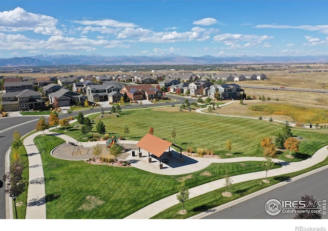 birds eye view of property featuring a residential view and a mountain view