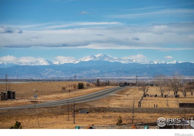 view of mountain feature with a rural view