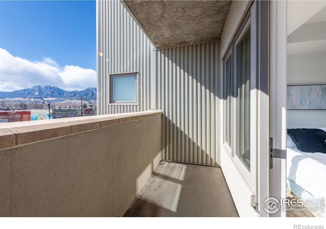 balcony featuring a mountain view