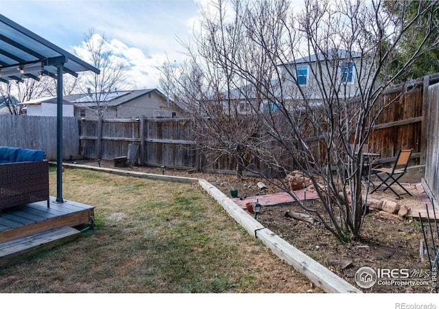 view of yard with a fenced backyard