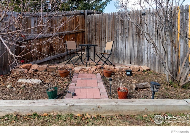 view of patio / terrace with fence