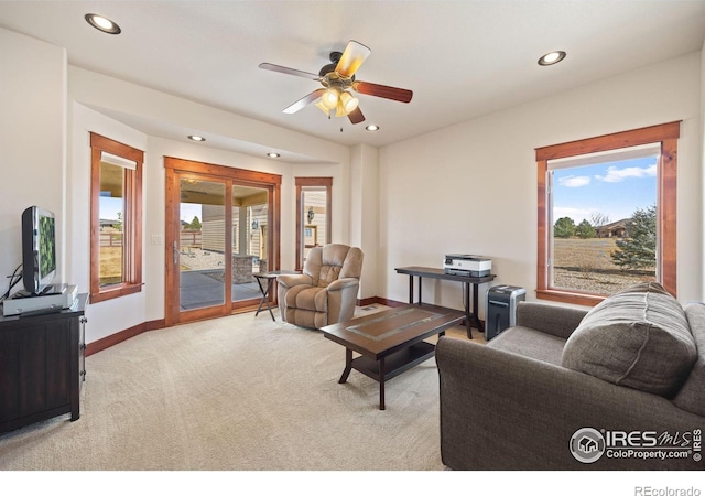 living room with a ceiling fan, carpet, baseboards, and recessed lighting