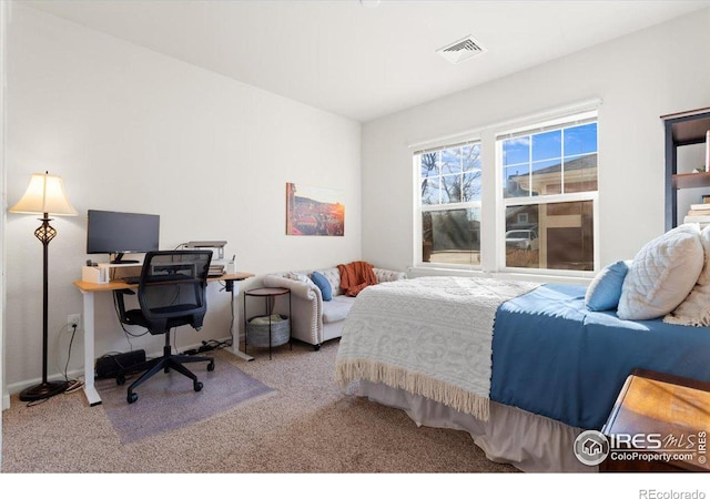 bedroom featuring carpet and visible vents