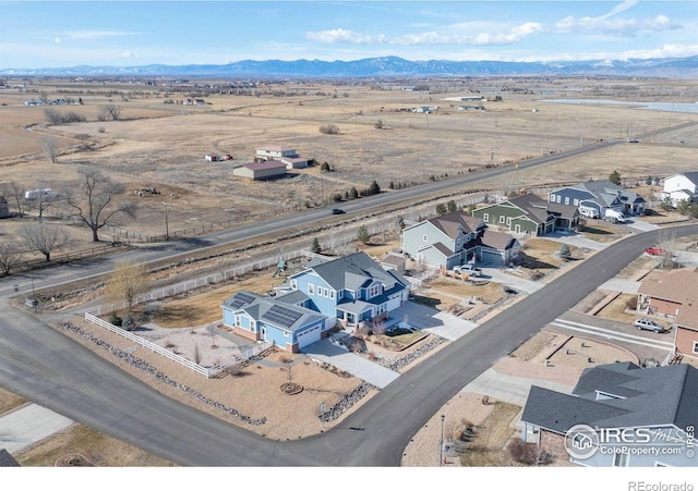 bird's eye view featuring a residential view and a mountain view