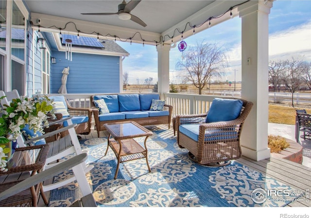 view of patio / terrace with ceiling fan and outdoor lounge area