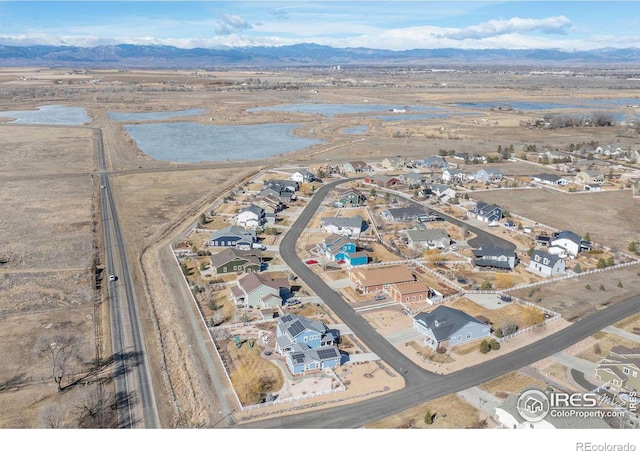 aerial view featuring a residential view and a mountain view