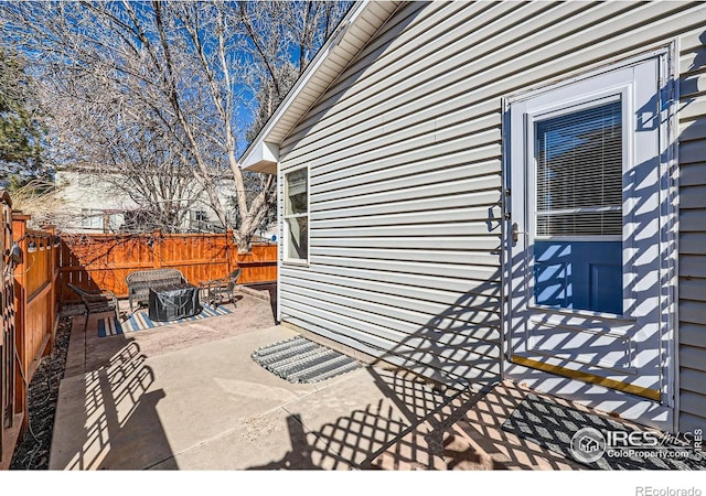 view of patio with a fenced backyard