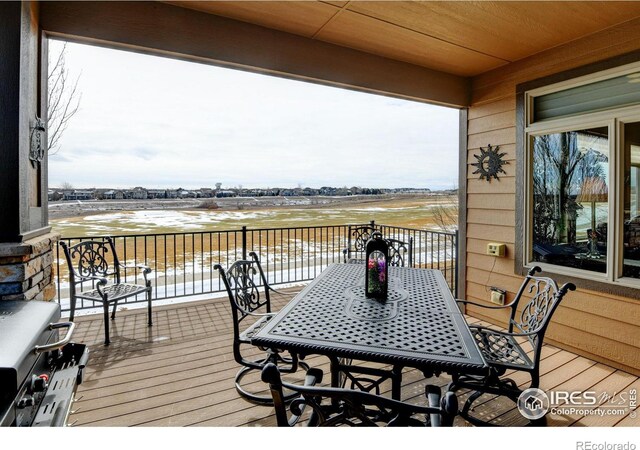 deck featuring outdoor dining space