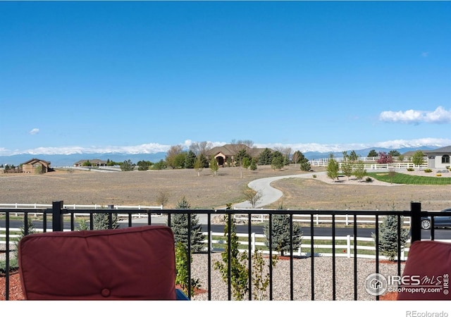 balcony featuring a mountain view and area for grilling