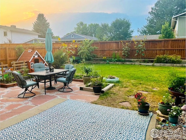 view of patio / terrace with outdoor dining space and fence