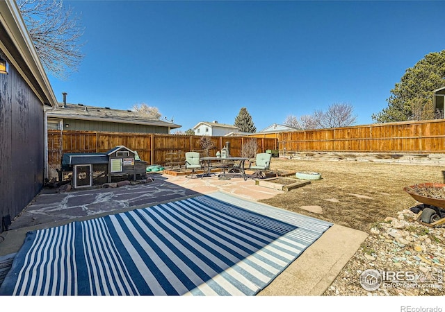 view of patio with a fenced backyard