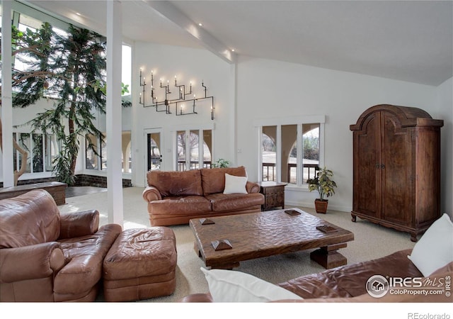 living area featuring high vaulted ceiling and light carpet