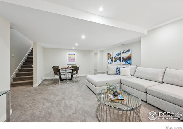 living room with carpet floors, stairs, baseboards, and recessed lighting