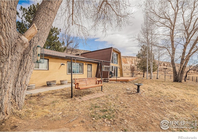 rear view of house with a deck