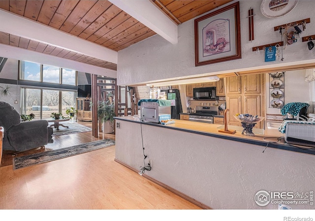 kitchen featuring light wood finished floors, electric range, a textured wall, wood ceiling, and black microwave