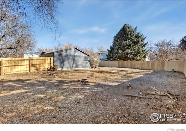 view of yard featuring a fenced backyard