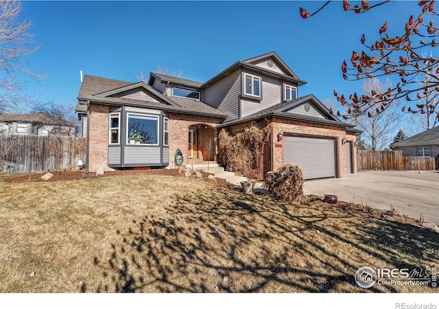 view of front of property featuring a garage, brick siding, fence, driveway, and a front yard