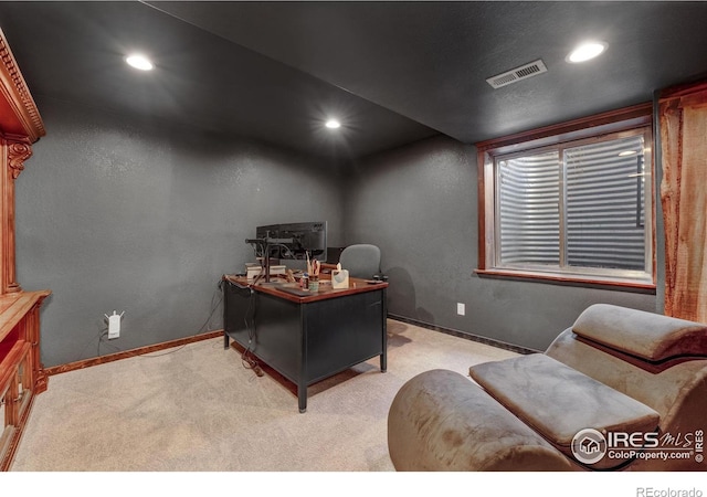 office space with carpet floors, recessed lighting, visible vents, and baseboards