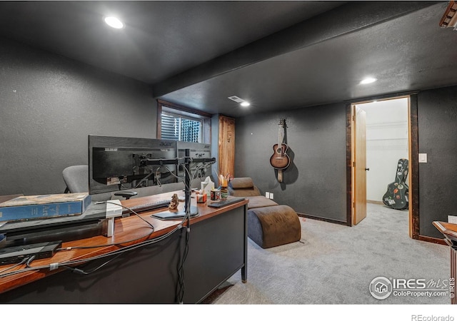 office featuring carpet floors, recessed lighting, and a textured wall