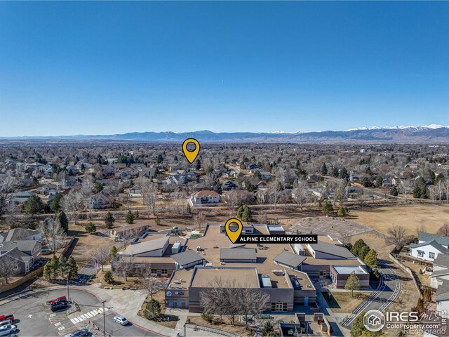 drone / aerial view with a residential view and a mountain view