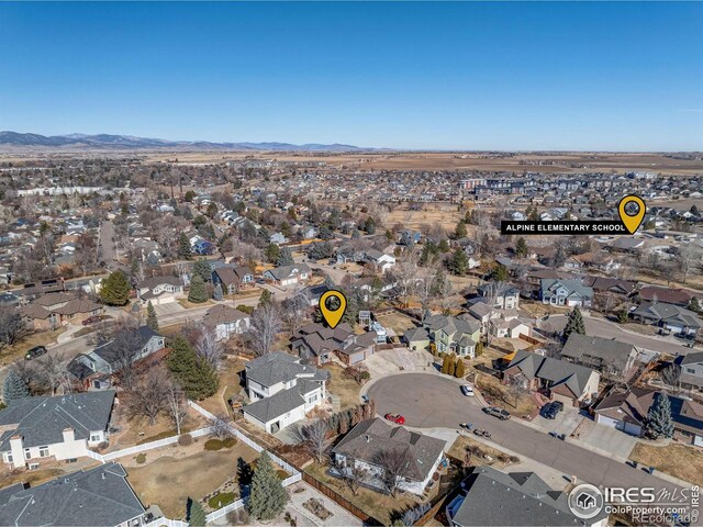 aerial view with a residential view and a mountain view