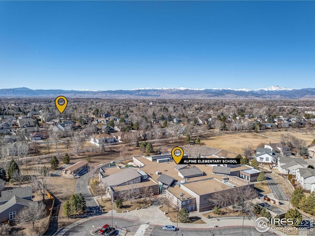 bird's eye view featuring a residential view and a mountain view