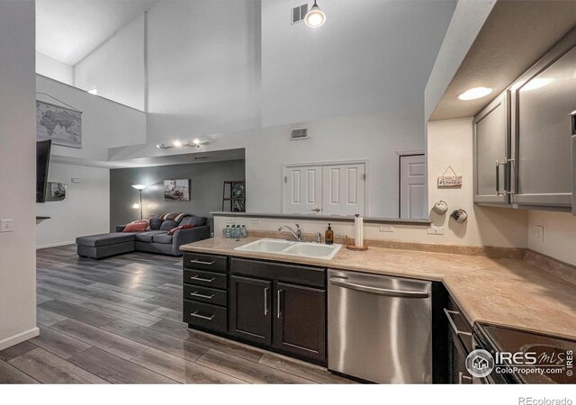 1004 Lucca Dr, Evans, CO 80620 - kitchen featuring a peninsula, dishwasher, a sink, and visible vents