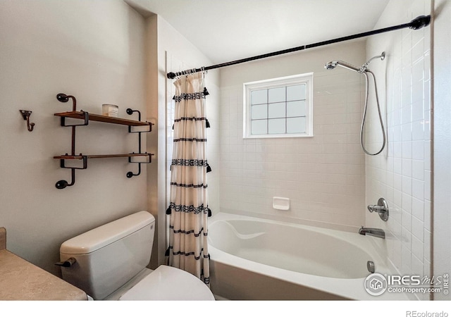 1004 Lucca Dr, Evans, CO 80620 - bathroom featuring toilet and shower / bath combo