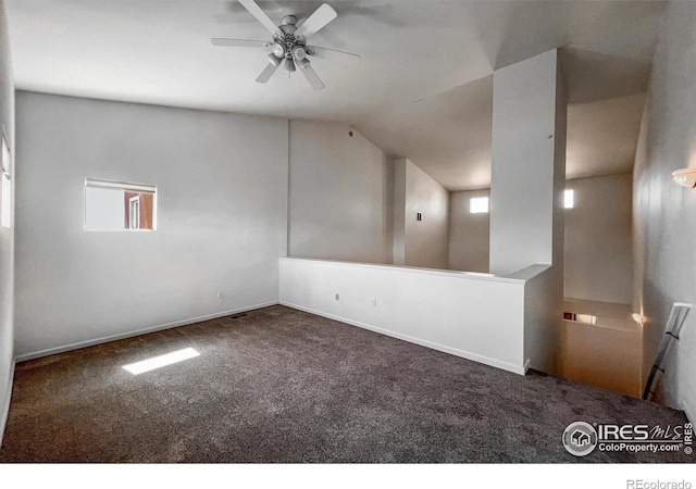 1004 Lucca Dr, Evans, CO 80620 - interior space featuring baseboards, vaulted ceiling, and ceiling fan