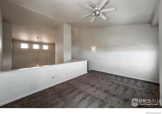 1004 Lucca Dr, Evans, CO 80620 - empty room with ceiling fan, baseboards, and carpet