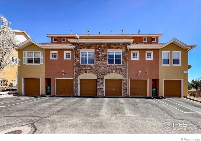 1004 Lucca Dr, Evans, CO 80620 - view of building exterior featuring an attached garage