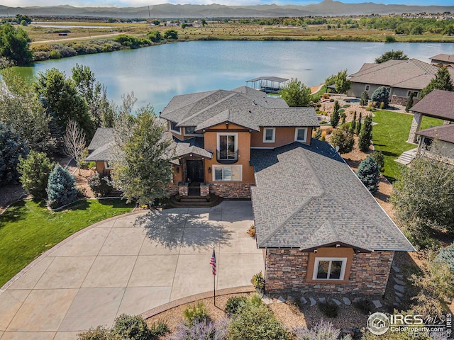 birds eye view of property featuring a water view