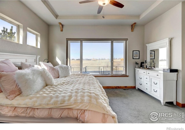 bedroom with a ceiling fan, baseboards, light colored carpet, and access to exterior